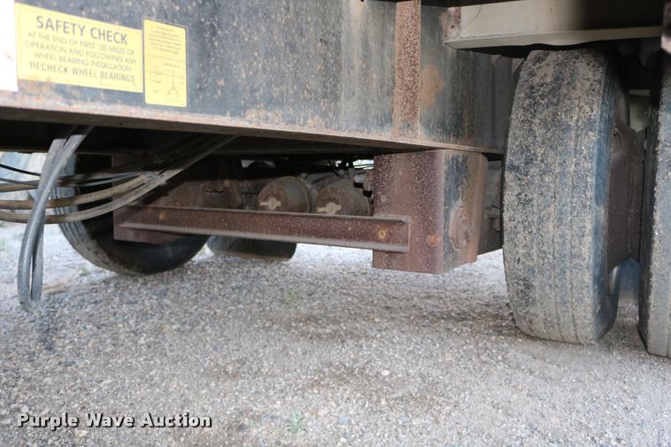 image for item DB9358 1999 Talbert TSDW-80K-T1-C drop deck equipment trailer