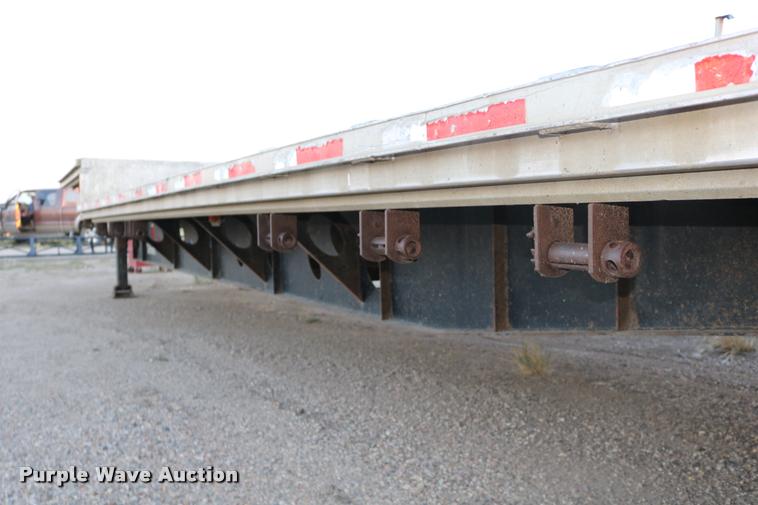 image for item DB9358 1999 Talbert TSDW-80K-T1-C drop deck equipment trailer