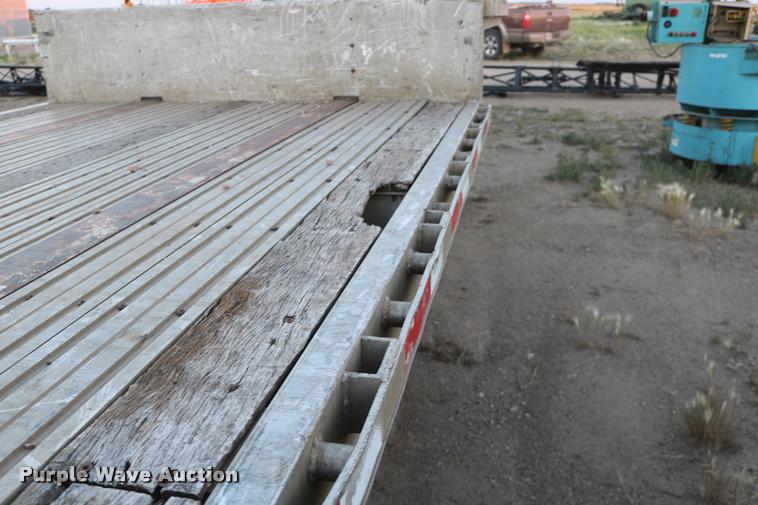 image for item DB9358 1999 Talbert TSDW-80K-T1-C drop deck equipment trailer