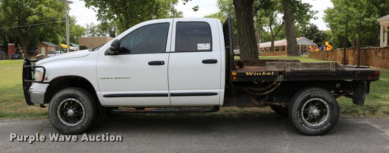 image for item DB9268 2004 Dodge Ram 2500 Quad Cab flatbed pickup truck