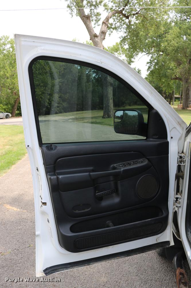 image for item DB9268 2004 Dodge Ram 2500 Quad Cab flatbed pickup truck