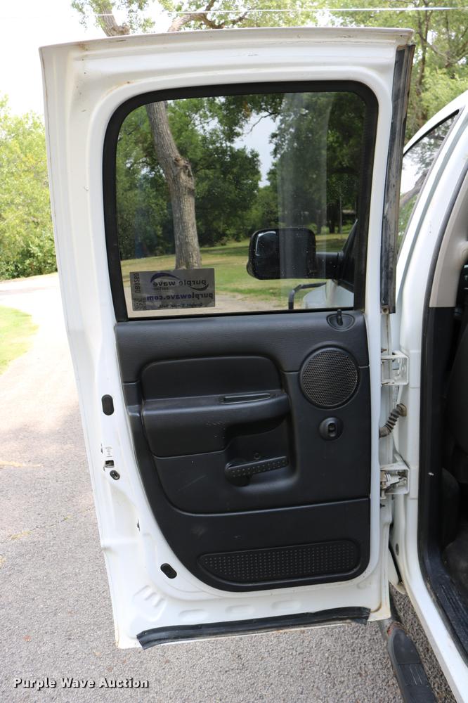 image for item DB9268 2004 Dodge Ram 2500 Quad Cab flatbed pickup truck