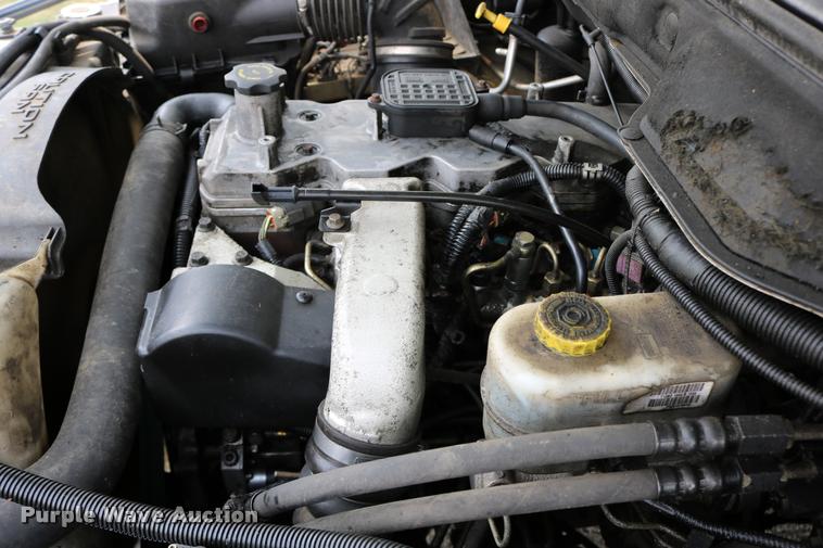 image for item DB9268 2004 Dodge Ram 2500 Quad Cab flatbed pickup truck