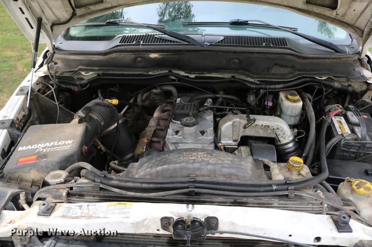 image for item DB9268 2004 Dodge Ram 2500 Quad Cab flatbed pickup truck