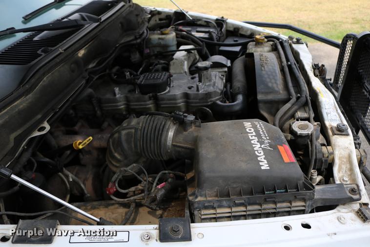 image for item DB9268 2004 Dodge Ram 2500 Quad Cab flatbed pickup truck