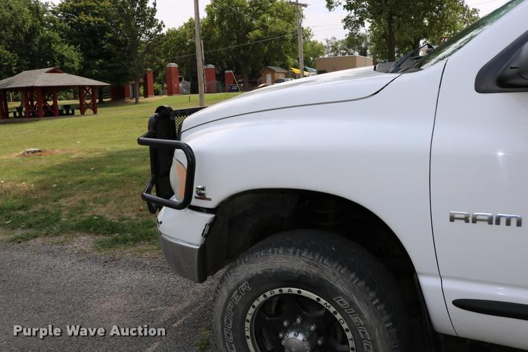 image for item DB9268 2004 Dodge Ram 2500 Quad Cab flatbed pickup truck