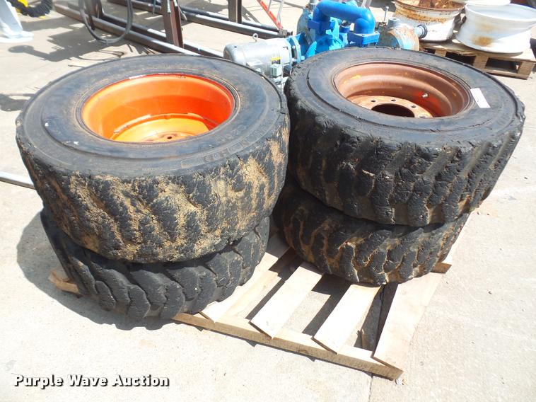 image for item DK9393 (4) 12-16.5 skid steer tires and wheels