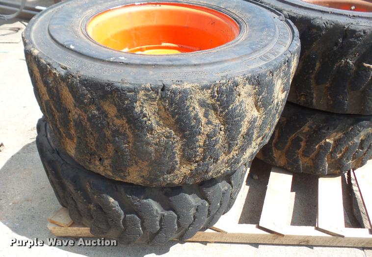 image for item DK9393 (4) 12-16.5 skid steer tires and wheels