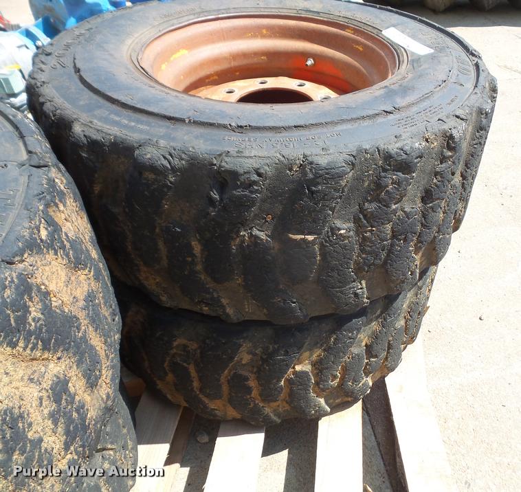 image for item DK9393 (4) 12-16.5 skid steer tires and wheels