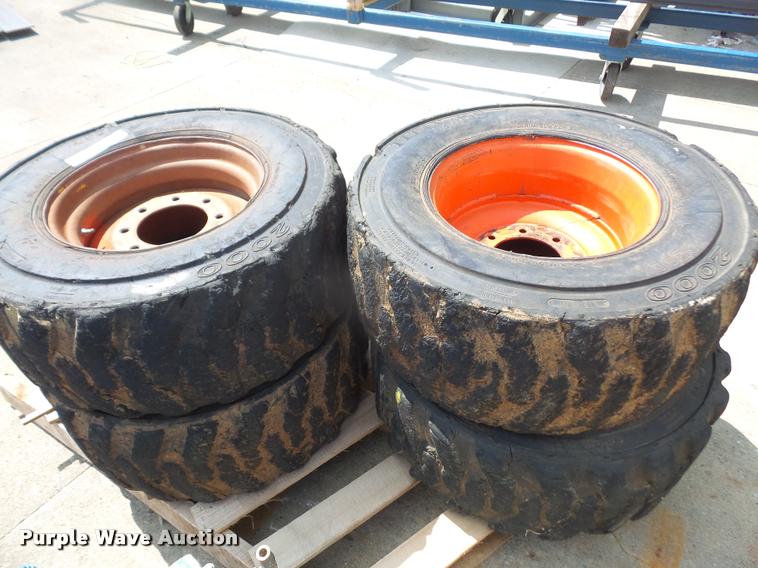 image for item DK9393 (4) 12-16.5 skid steer tires and wheels