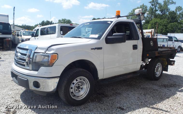 image for item K7548 2011 Ford F150 XLT flatbed pickup truck