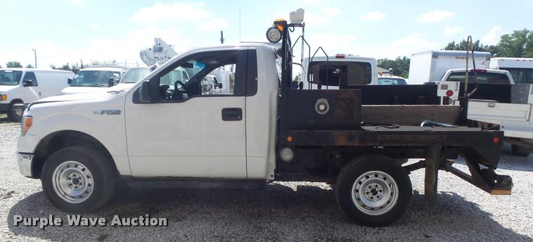 image for item K7548 2011 Ford F150 XLT flatbed pickup truck