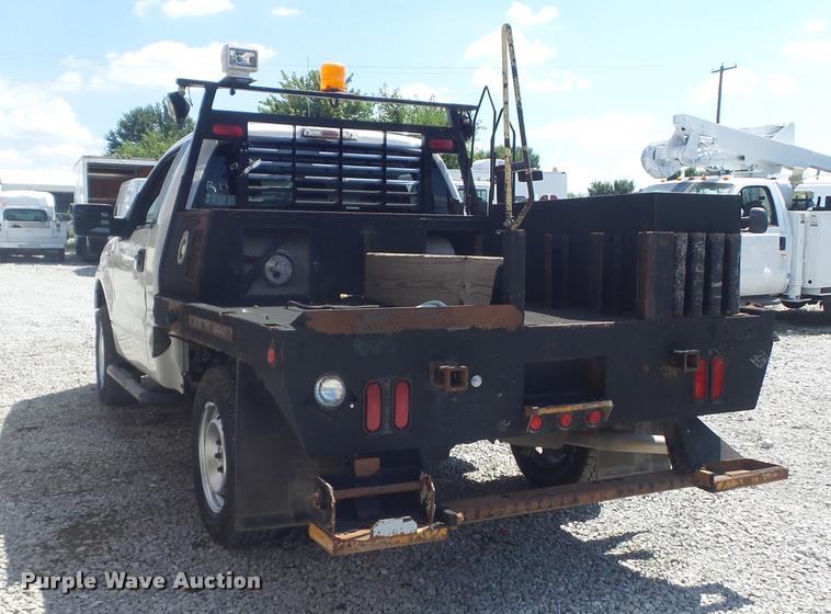 image for item K7548 2011 Ford F150 XLT flatbed pickup truck