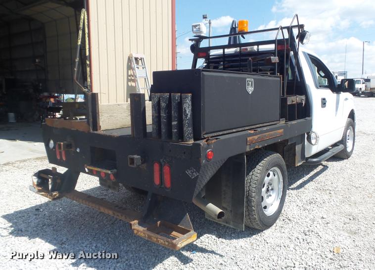 image for item K7548 2011 Ford F150 XLT flatbed pickup truck