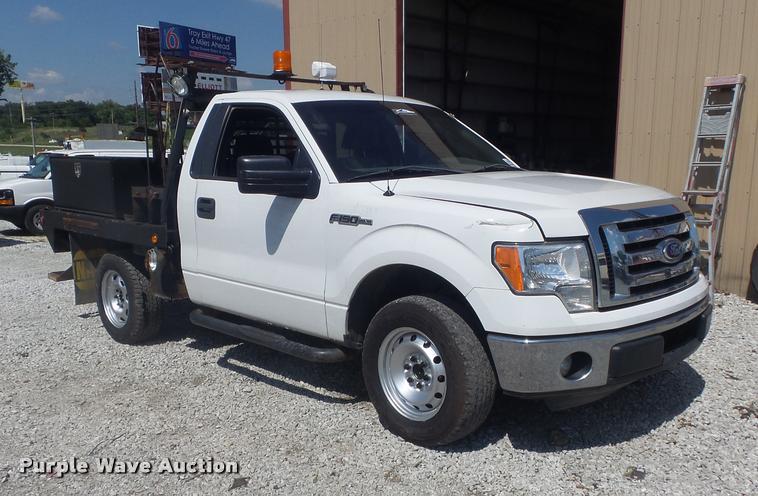 image for item K7548 2011 Ford F150 XLT flatbed pickup truck