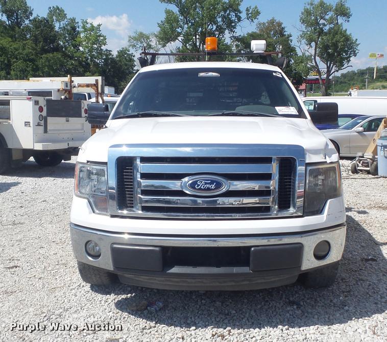 image for item K7548 2011 Ford F150 XLT flatbed pickup truck