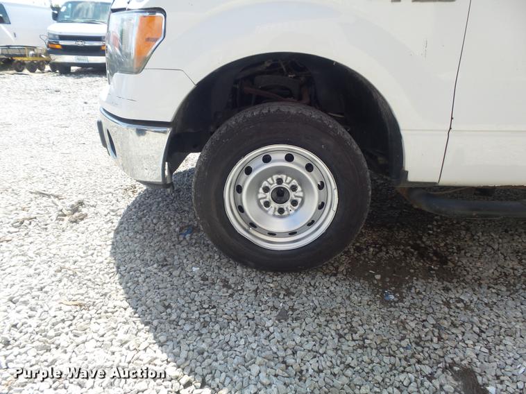 image for item K7548 2011 Ford F150 XLT flatbed pickup truck