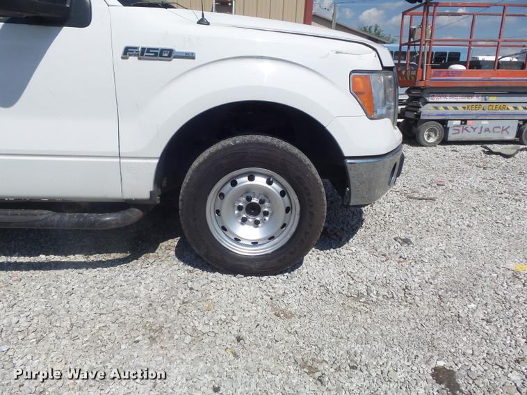 image for item K7548 2011 Ford F150 XLT flatbed pickup truck