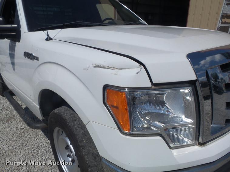 image for item K7548 2011 Ford F150 XLT flatbed pickup truck