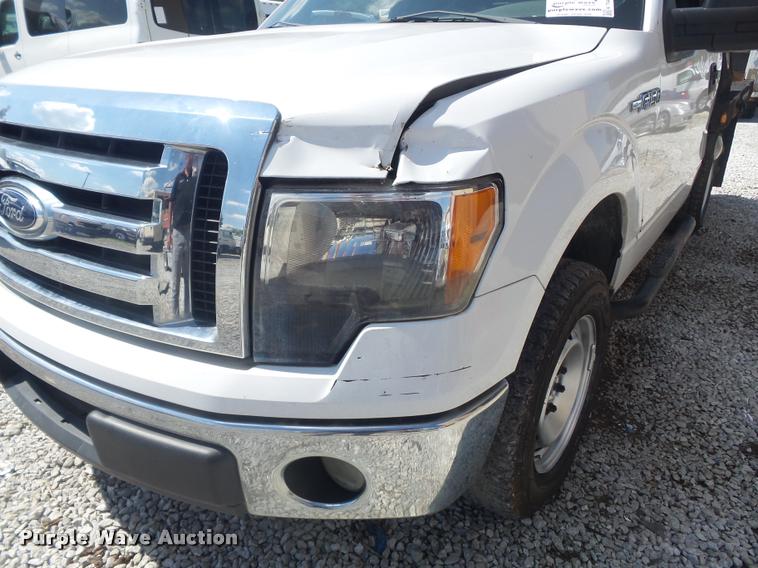 image for item K7548 2011 Ford F150 XLT flatbed pickup truck