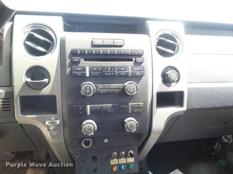 image for item K7548 2011 Ford F150 XLT flatbed pickup truck