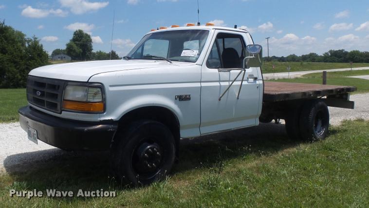 image for item K7557 1996 Ford F350 XL flatbed pickup truck