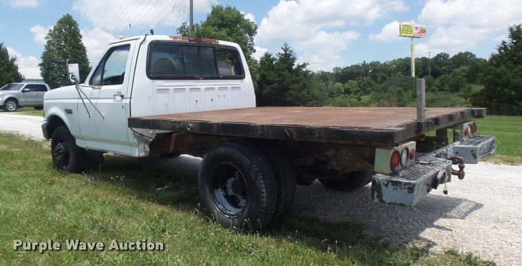 image for item K7557 1996 Ford F350 XL flatbed pickup truck
