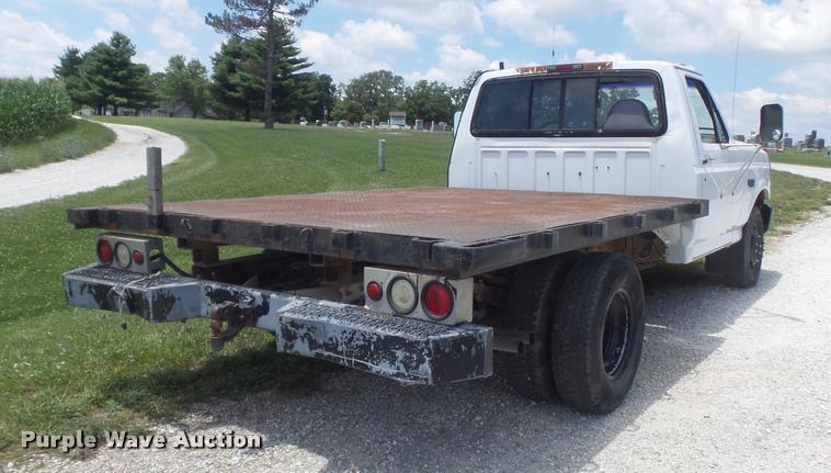image for item K7557 1996 Ford F350 XL flatbed pickup truck