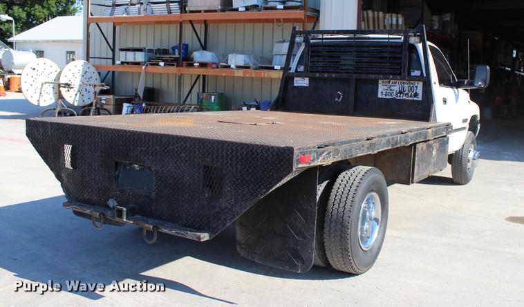 image for item L3177 2002 Dodge Ram 3500 SLT flatbed pickup truck
