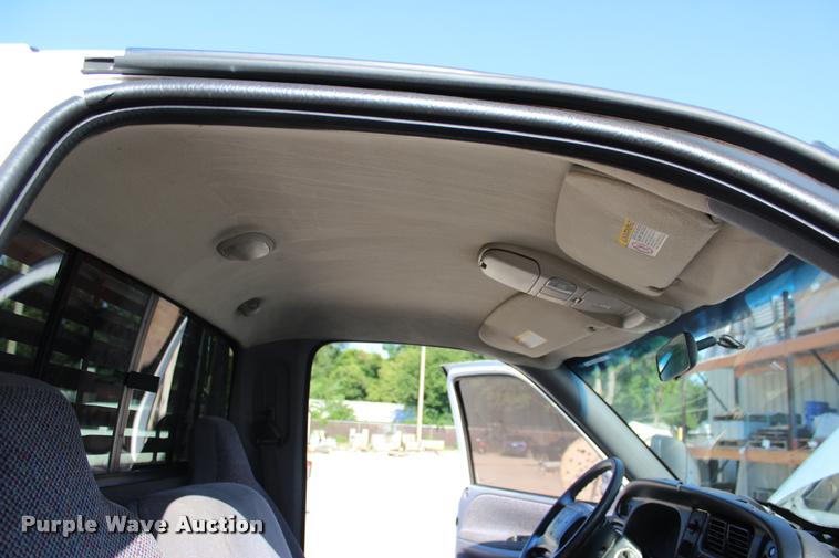 image for item L3177 2002 Dodge Ram 3500 SLT flatbed pickup truck