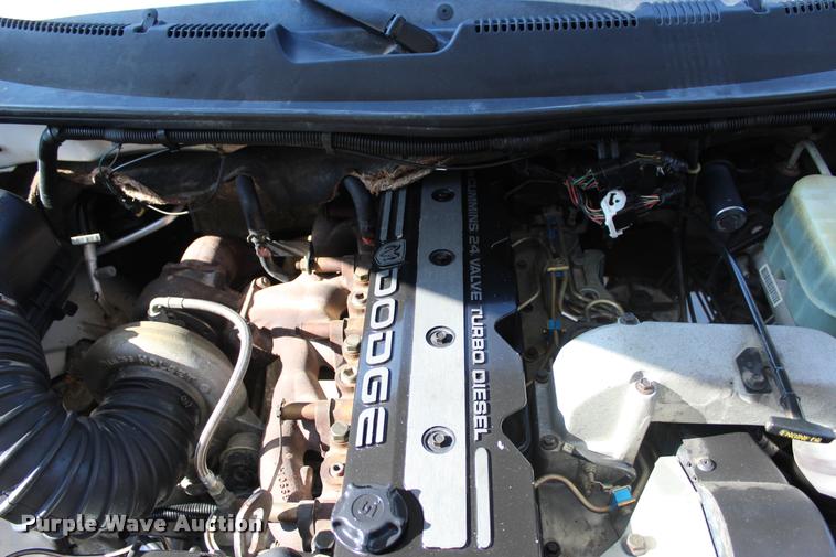 image for item L3177 2002 Dodge Ram 3500 SLT flatbed pickup truck