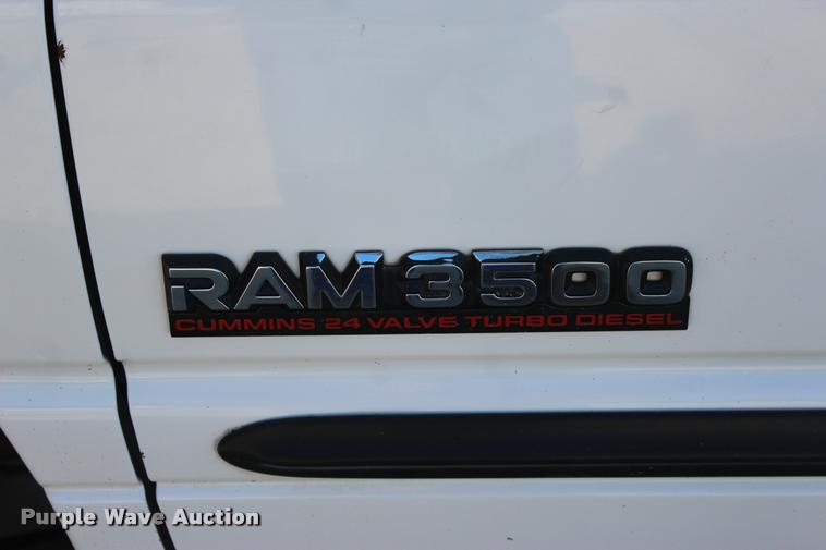 image for item L3177 2002 Dodge Ram 3500 SLT flatbed pickup truck