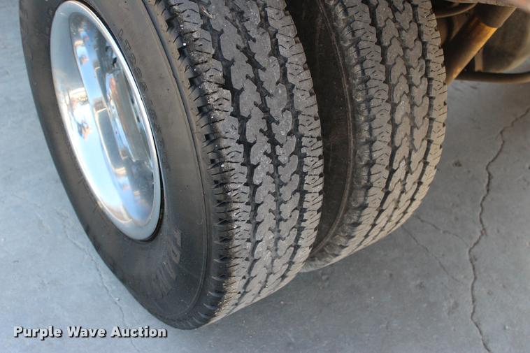 image for item L3177 2002 Dodge Ram 3500 SLT flatbed pickup truck