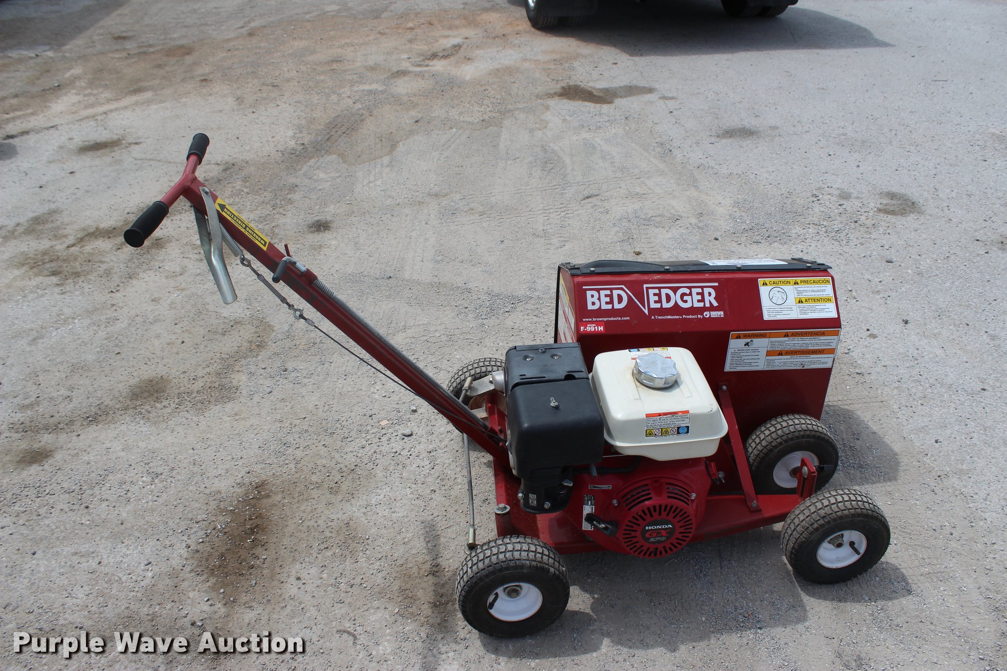 Brown F991H bed edger in Tulsa, OK Item L3202 sold Purple Wave