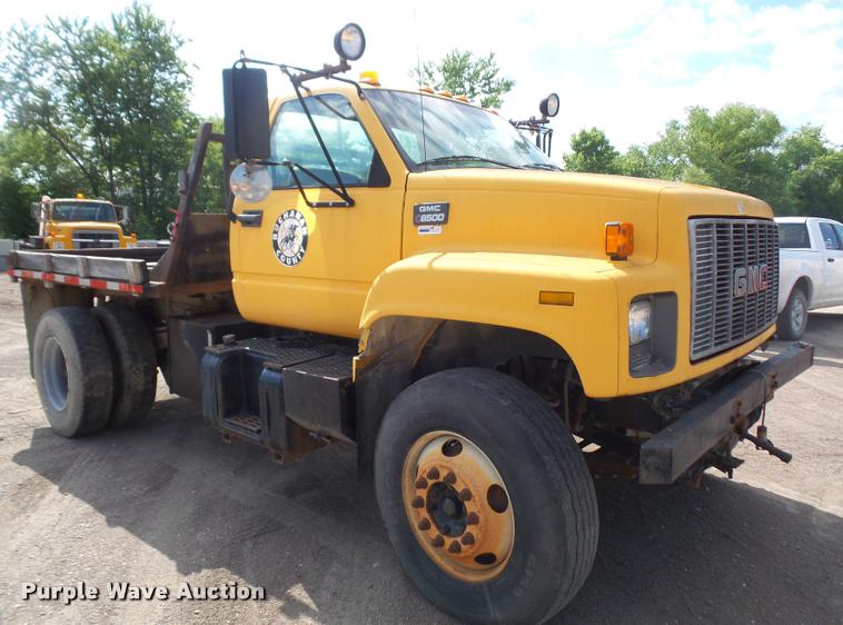 image for item DA1705 1997 GMC C7500 flatbed truck