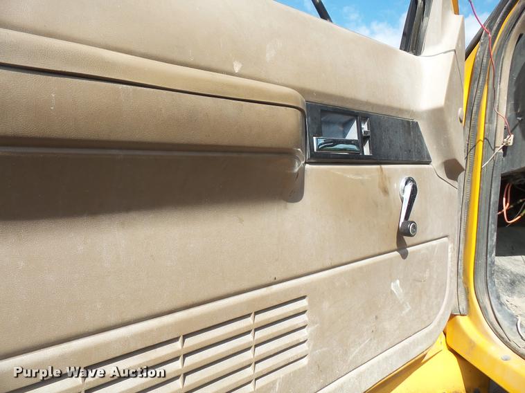 image for item DA1705 1997 GMC C7500 flatbed truck