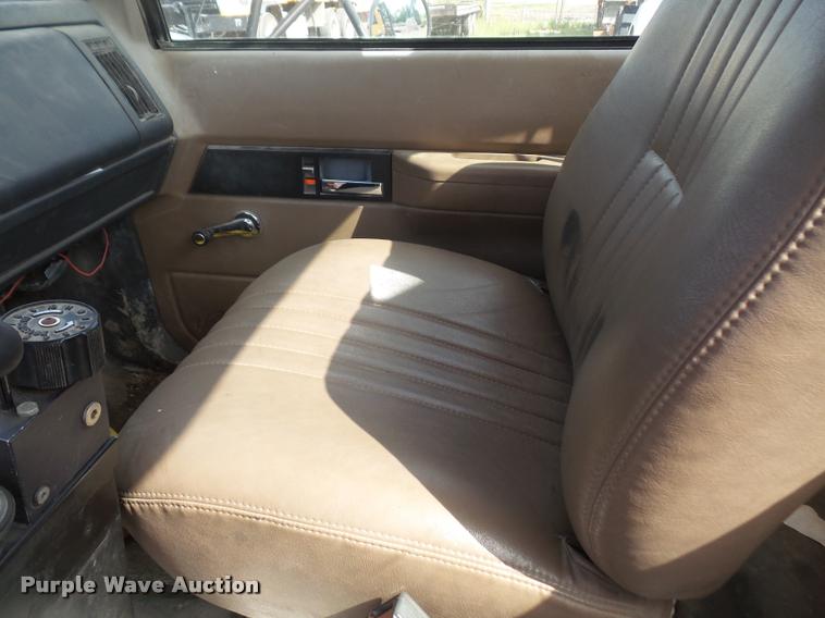 image for item DA1705 1997 GMC C7500 flatbed truck