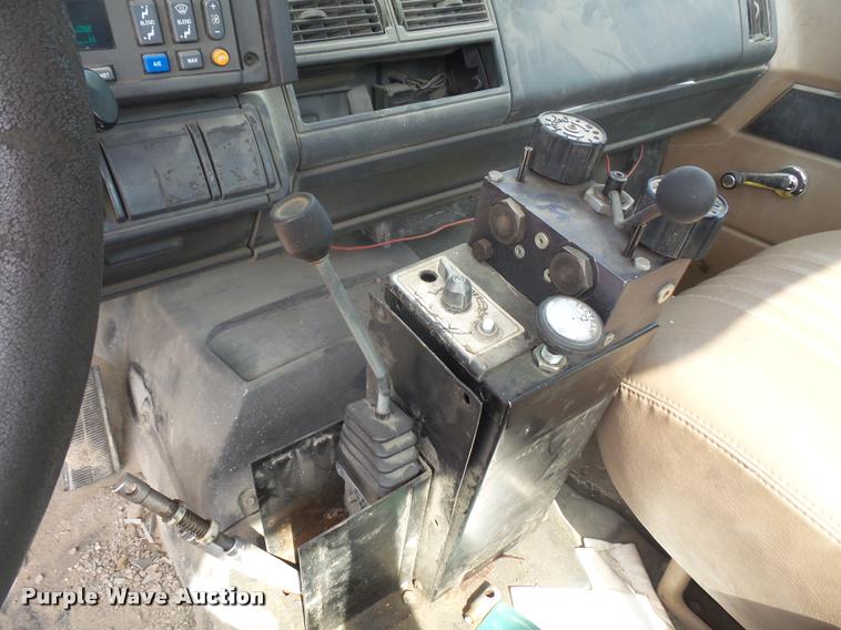 image for item DA1705 1997 GMC C7500 flatbed truck