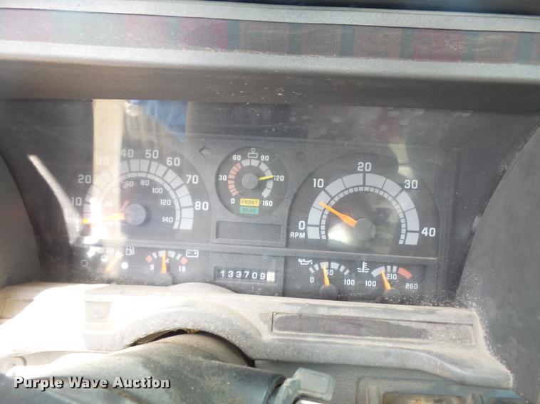 image for item DA1705 1997 GMC C7500 flatbed truck