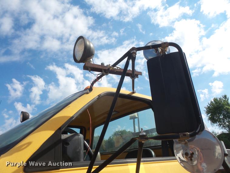 image for item DA1705 1997 GMC C7500 flatbed truck