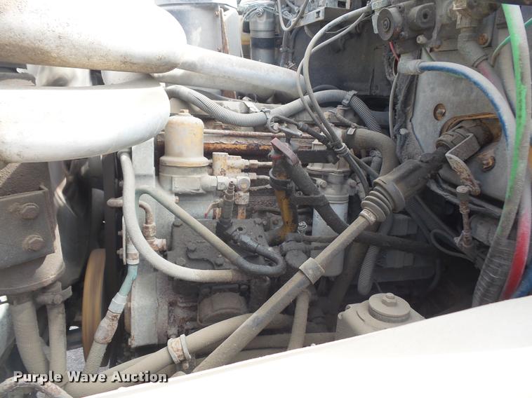 image for item DA1705 1997 GMC C7500 flatbed truck