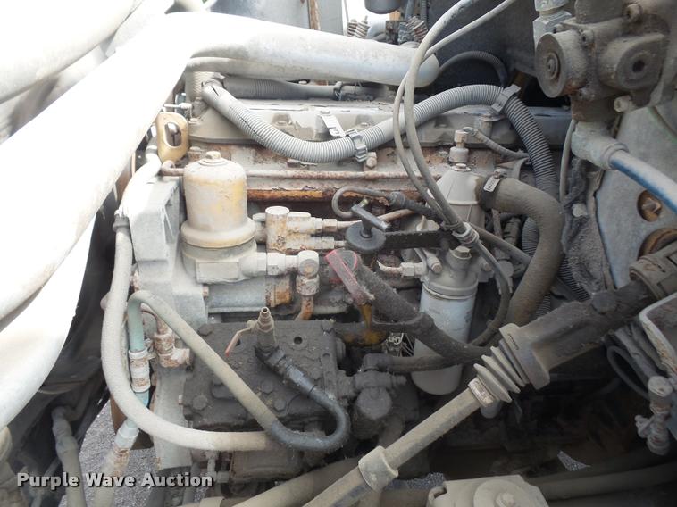 image for item DA1705 1997 GMC C7500 flatbed truck