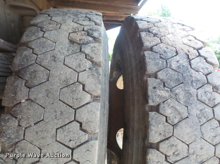 image for item DA1705 1997 GMC C7500 flatbed truck