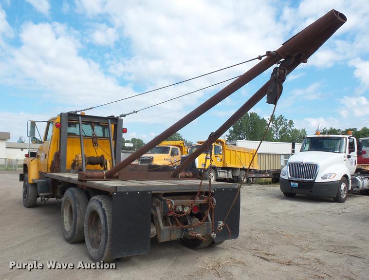 image for item DA1707 1991 Ford LT8000 flat winch truck
