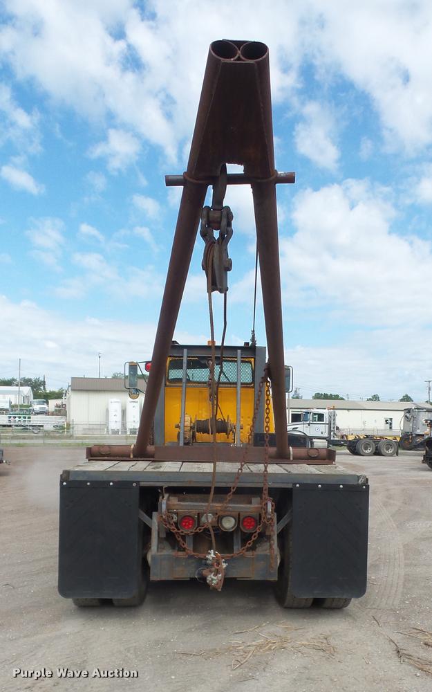 image for item DA1707 1991 Ford LT8000 flat winch truck