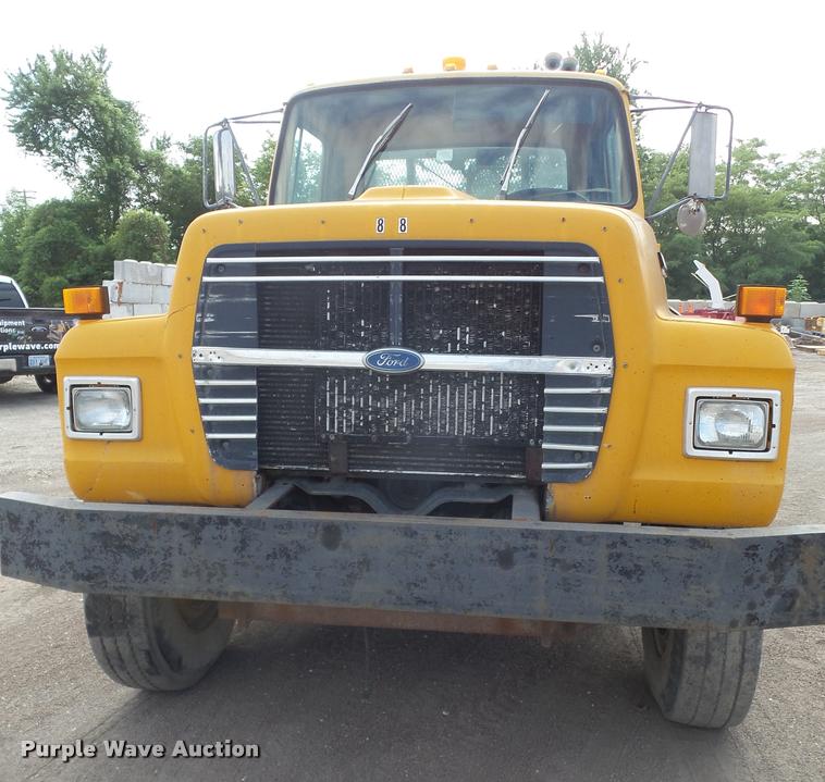 image for item DA1707 1991 Ford LT8000 flat winch truck