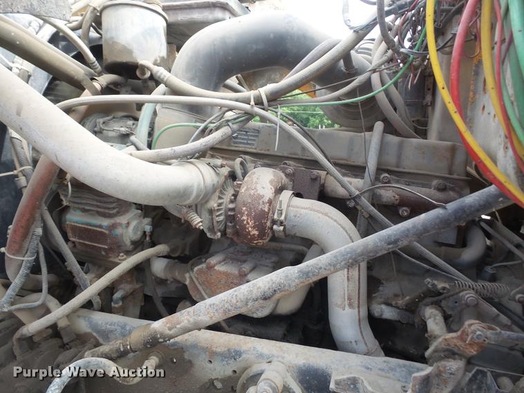 image for item DA1707 1991 Ford LT8000 flat winch truck