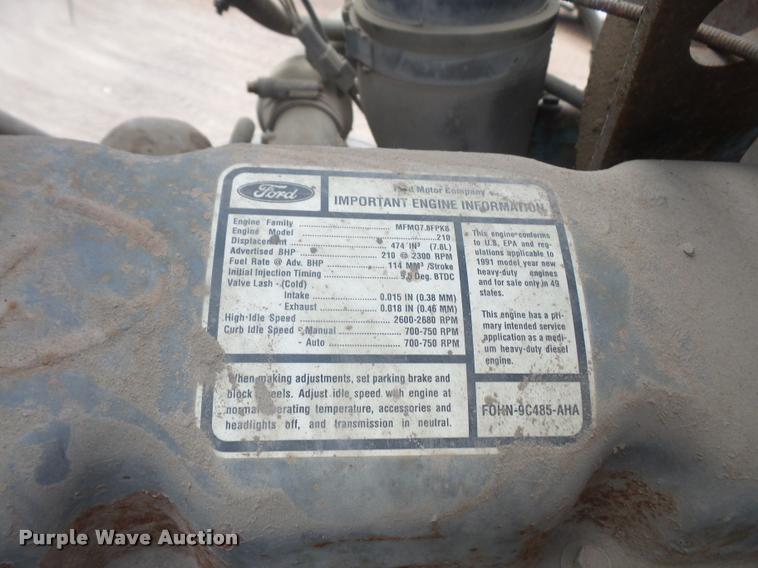 image for item DA1707 1991 Ford LT8000 flat winch truck