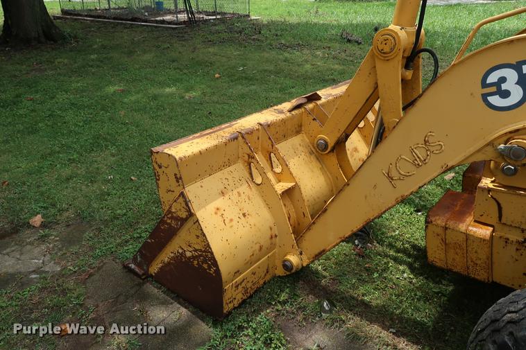 image for item DD1695 2002 John Deere 310G backhoe