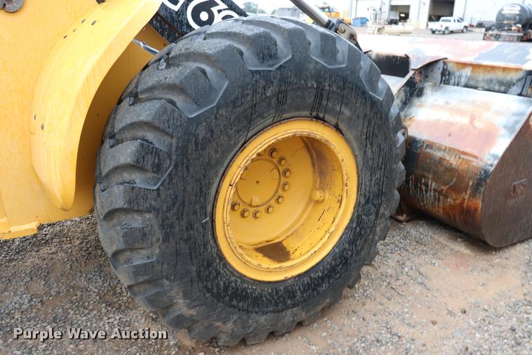 image for item DK9535 2000 John Deere TC62H wheel loader